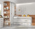 Chambre enfant avec lit gigogne avec escalier et 3 tiroirs, armoire d'angle, et bureau avec tiroirs
