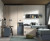 Chambre enfant avec deux lits compacts, armoires et bureau avec module à roulettes