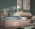 Chambre enfant avec lit compact avec tiroirs, bureau, et étagères